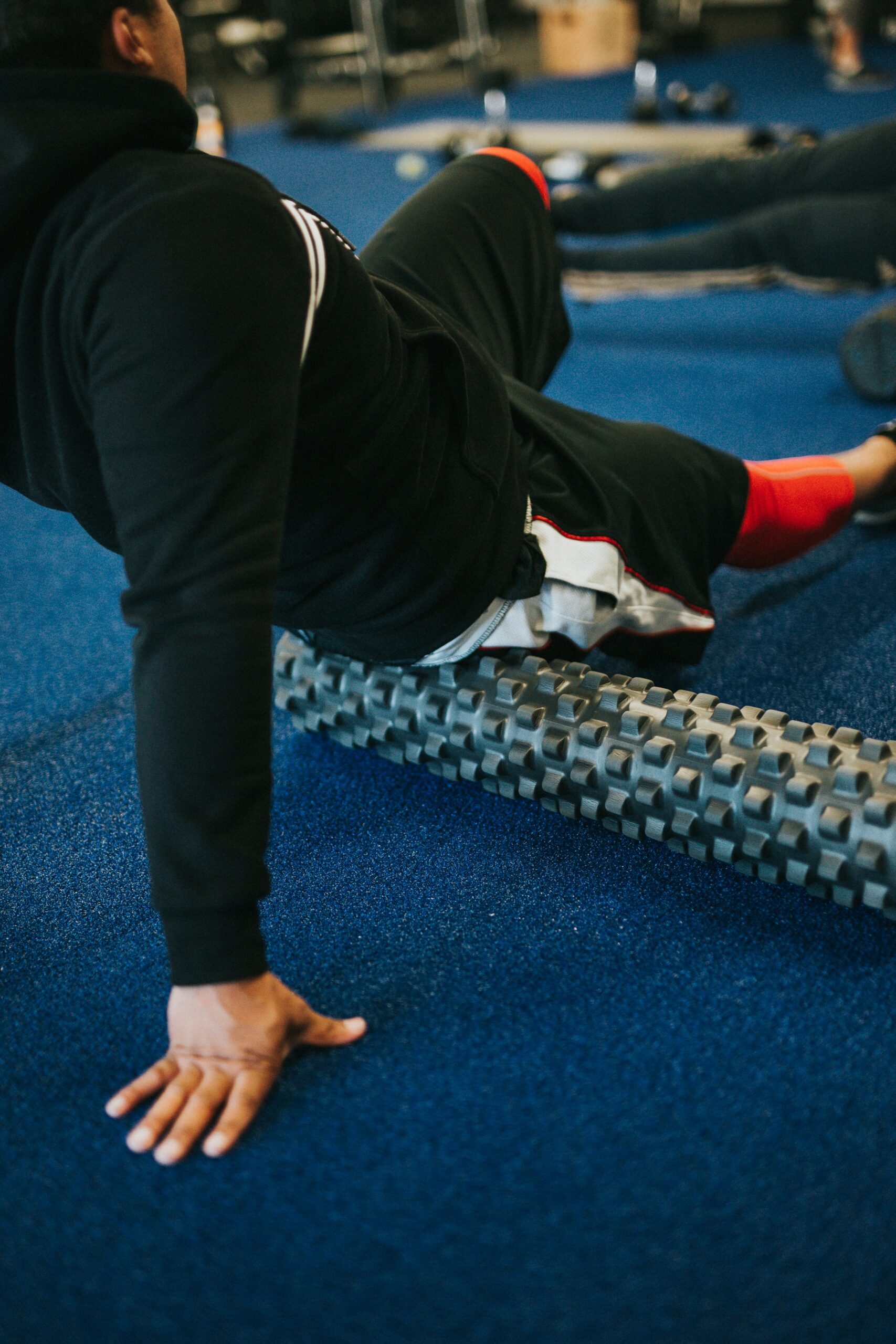 Man using a foam roller