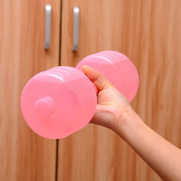 Pink water dumbbell in someones hand