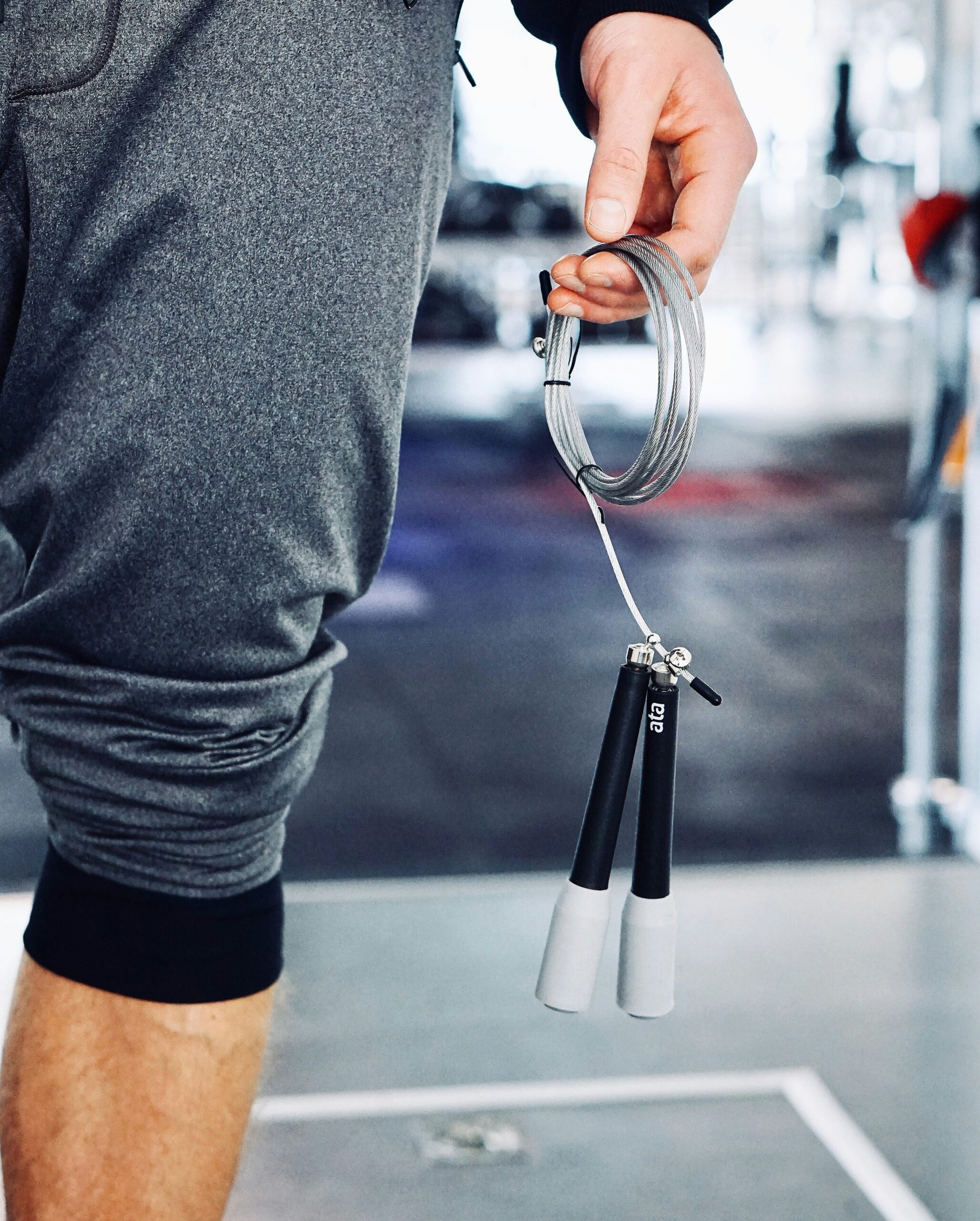 Person holding a skipping rope